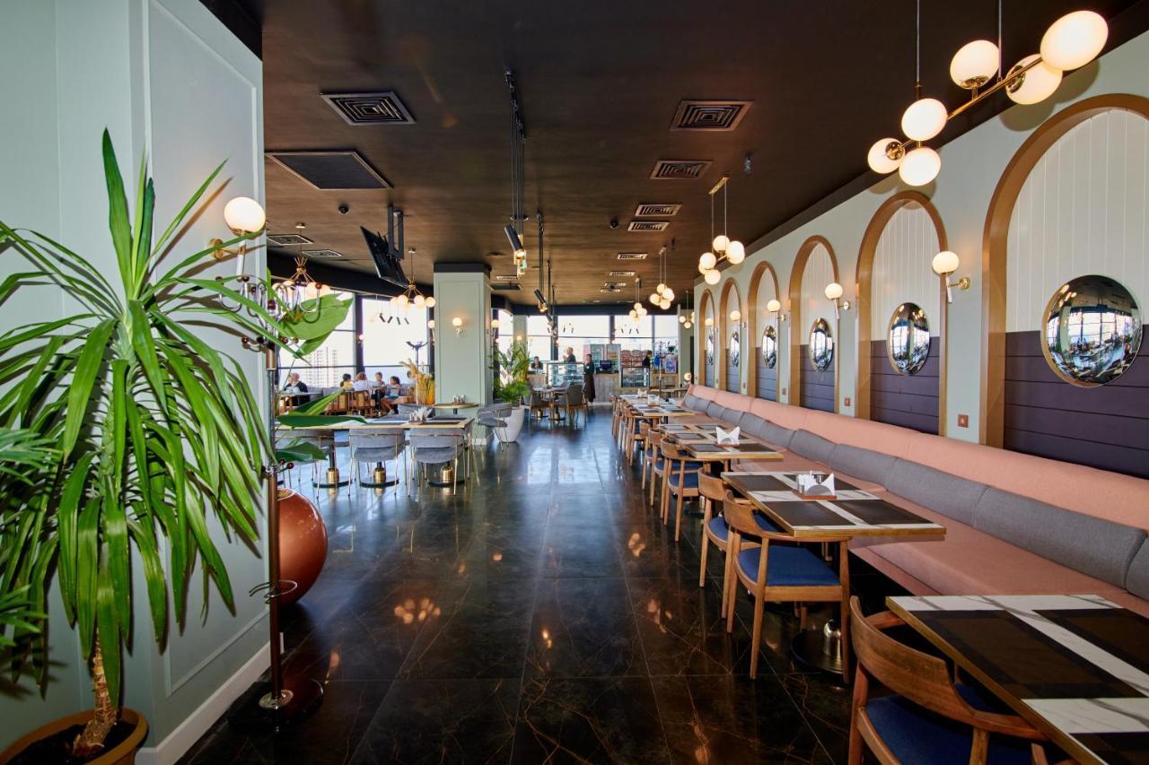 Grand Hotel Victory Aktau  Ngoại thất bức ảnh Restaurant interior