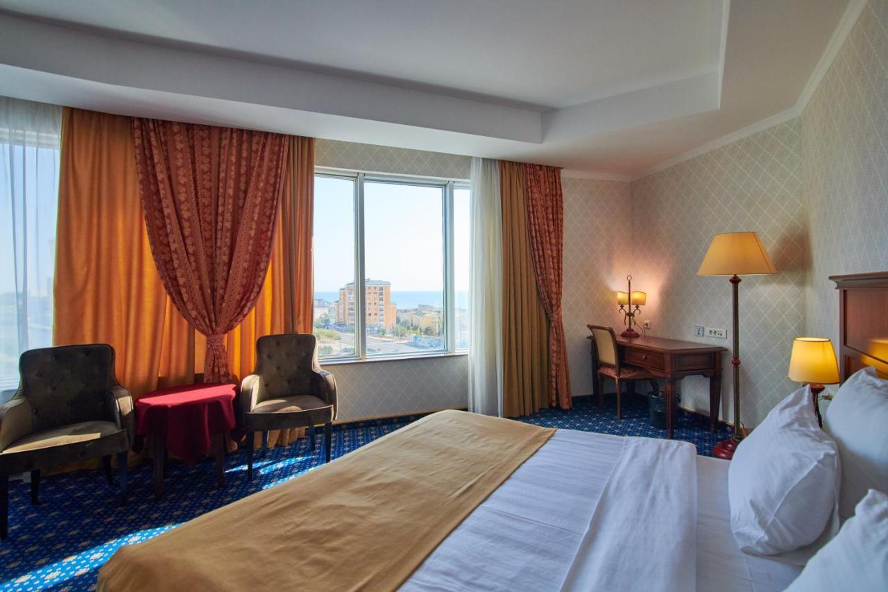 Grand Hotel Victory Aktau  Ngoại thất bức ảnh A room at the Radisson Blu Hotel, Baku