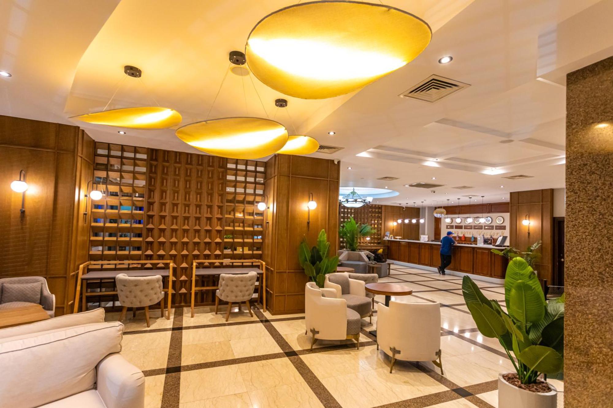 Grand Hotel Victory Aktau  Ngoại thất bức ảnh Lobby
