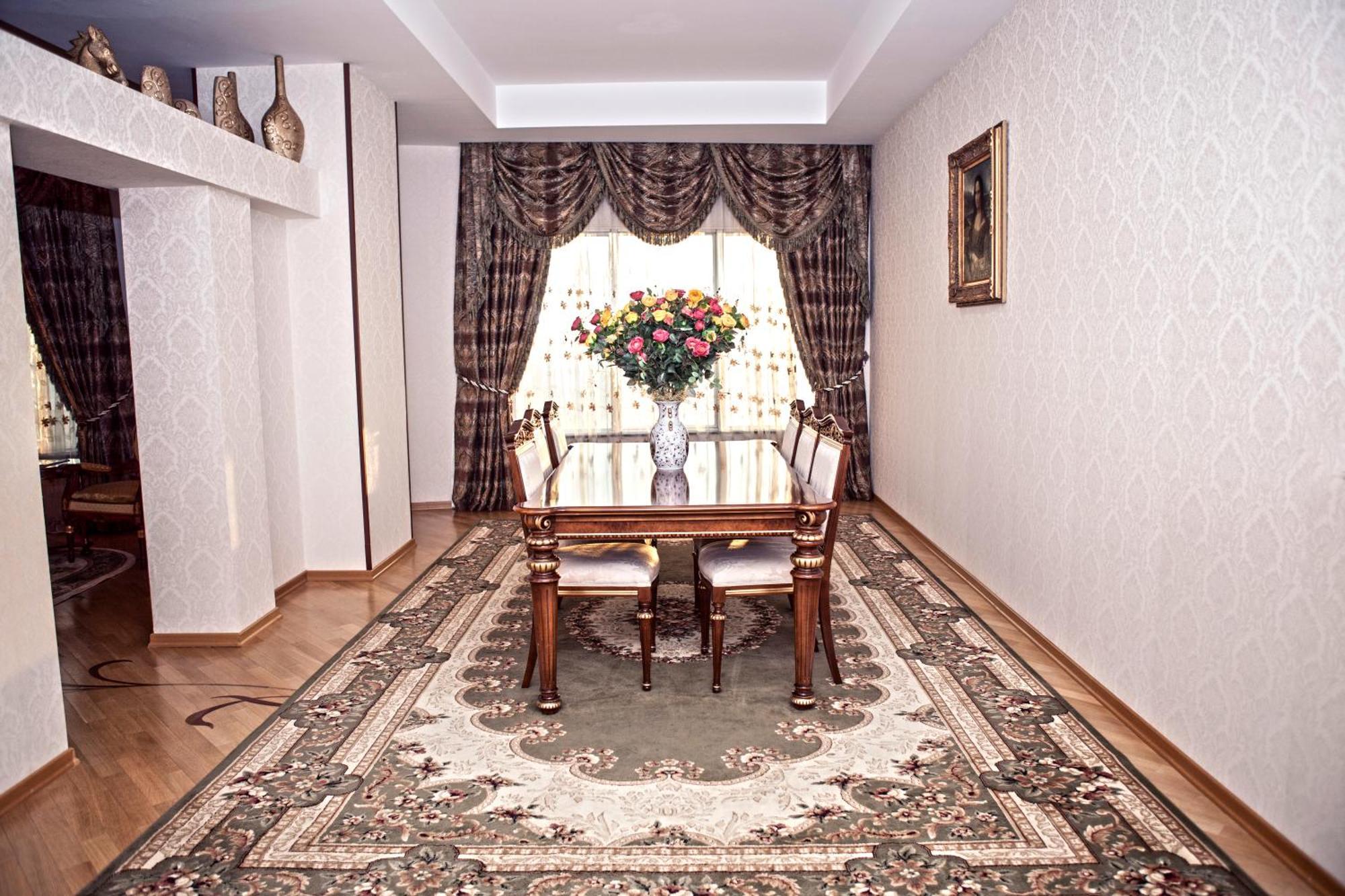 Grand Hotel Victory Aktau  Ngoại thất bức ảnh A dining room