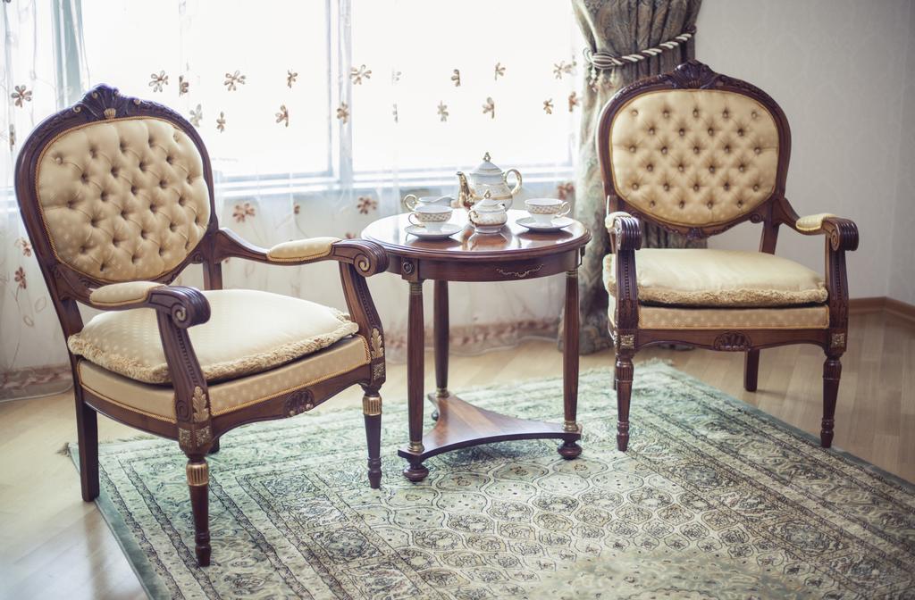 Grand Hotel Victory Aktau  Ngoại thất bức ảnh A carpet in a living room